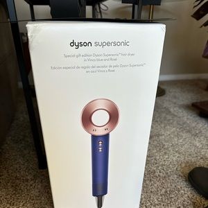 Dyson supersonic hair dryer. Brand new in box. Was gift but - not my style.